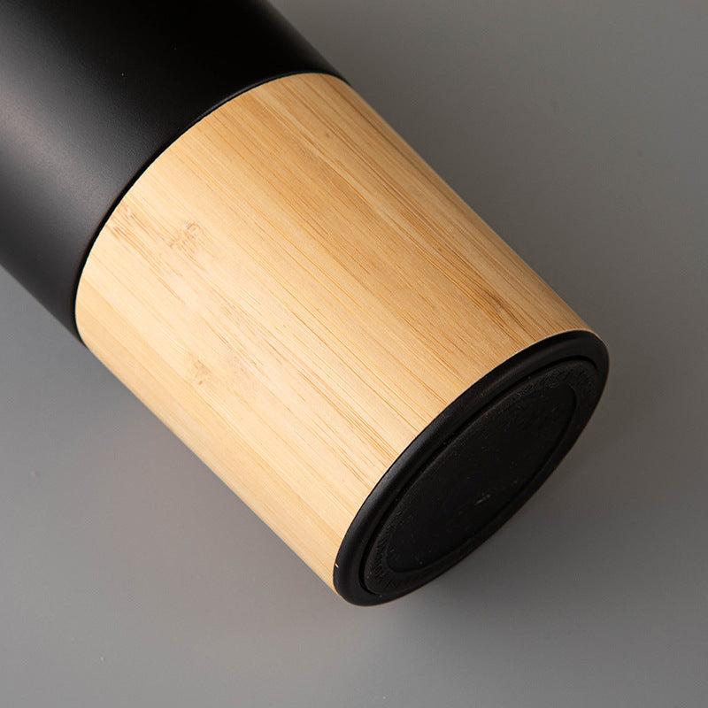 Double-Walled Stainless Steel Insulated Tumbler with Bamboo Shell Sleeve – 20oz Travel Mug for Coffee, Outdoor, and Car Use