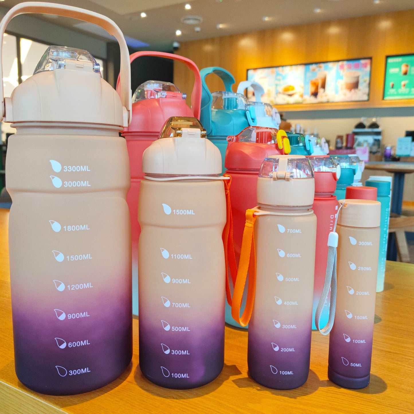 Elevate Your Hydration Game! 4-Piece Ombré Sport Bottle Set